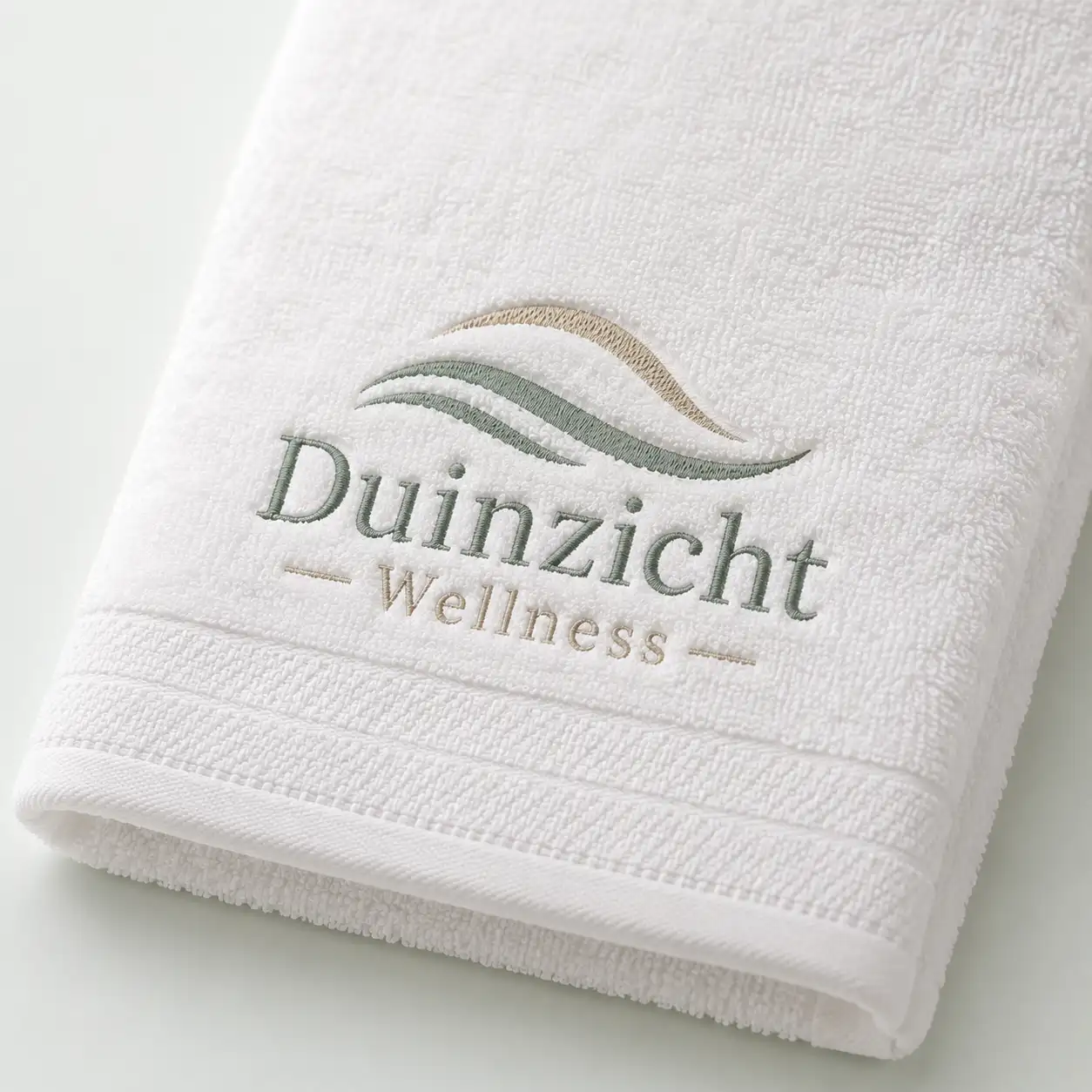 Geborduurde handdoek met logo